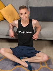 Super cute Colombian twink Nick Danner poses naked on the rug.