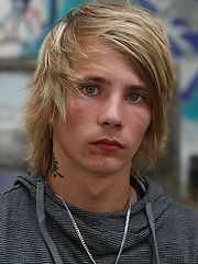 Cute alternative boy showing his naked body