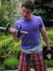 Keaton works his biceps and then his love muscle.